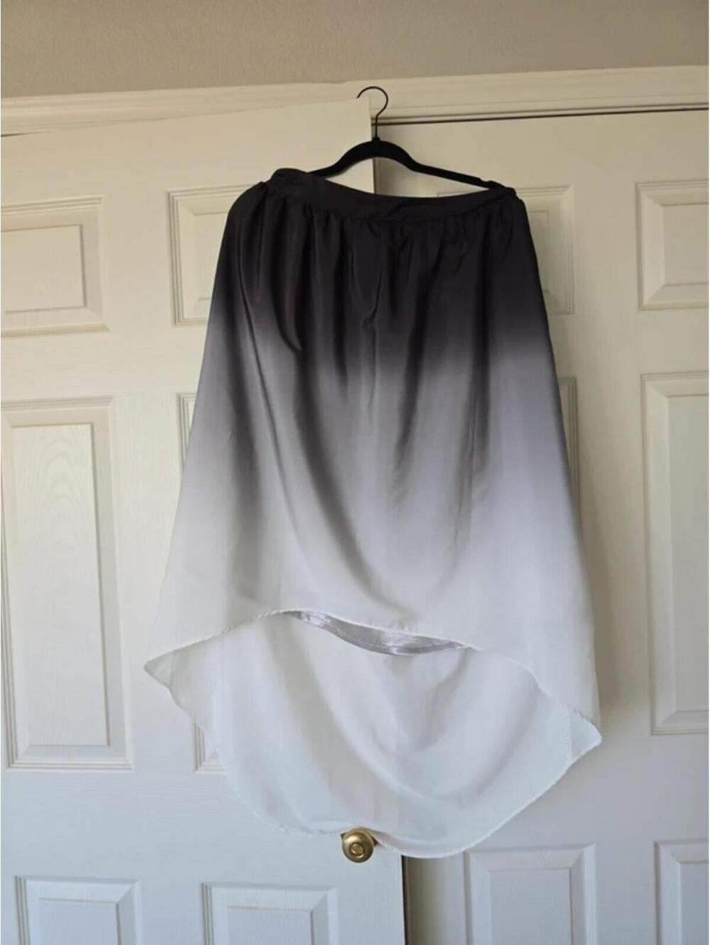 Sale! 3/$10 Mix & Match 3 Items Marked $5.High low skirt. Sheer & lined